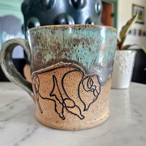 Handcrafted Ceramic Mug with Buffalo And Elk Design